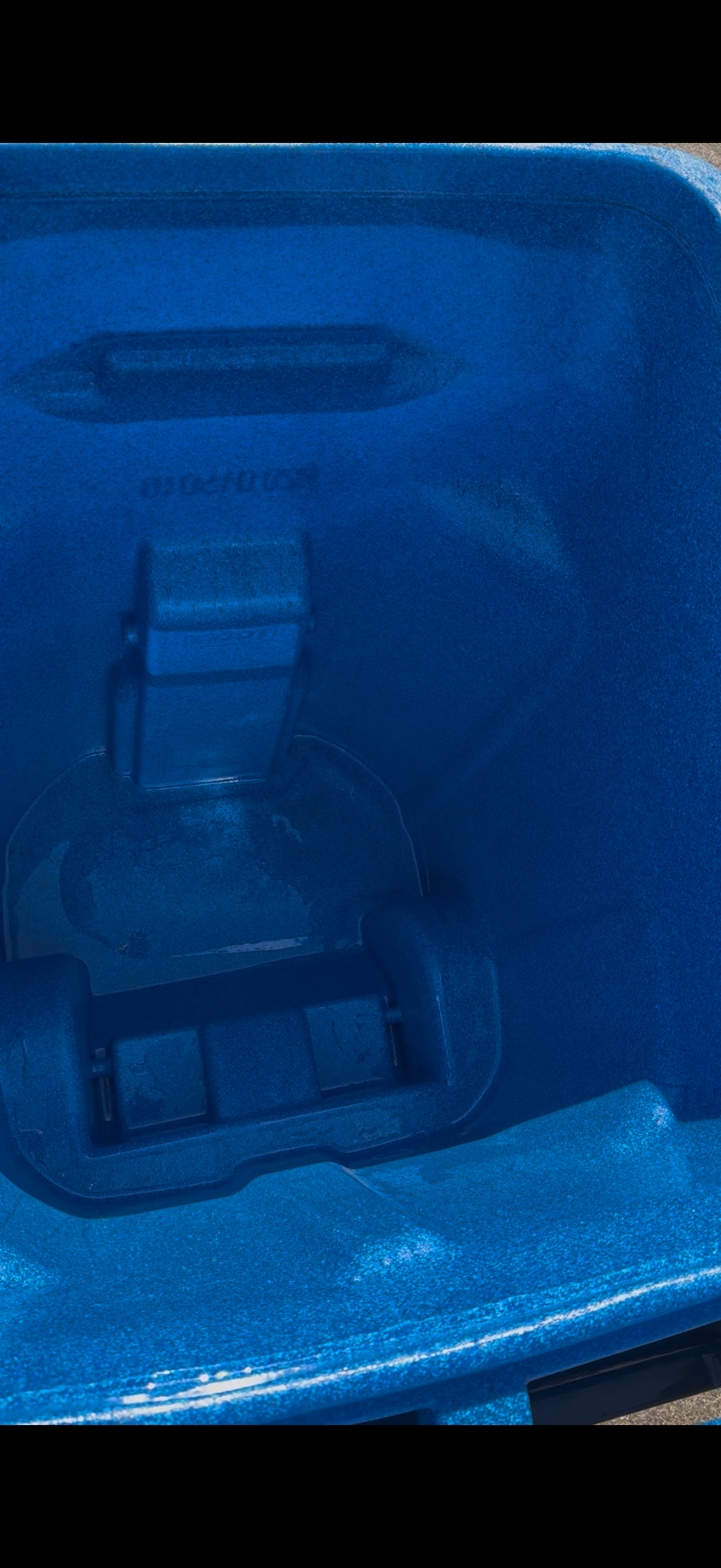 Clean blue trash can — after
